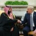 US President Donald Trump (R) shakes hands with Saudi Arabia's Crown Prince Mohammed bin Salman in the Oval Office of the White House on March 20, 2018 in Washington, DC. (Photo by MANDEL NGAN / AFP)